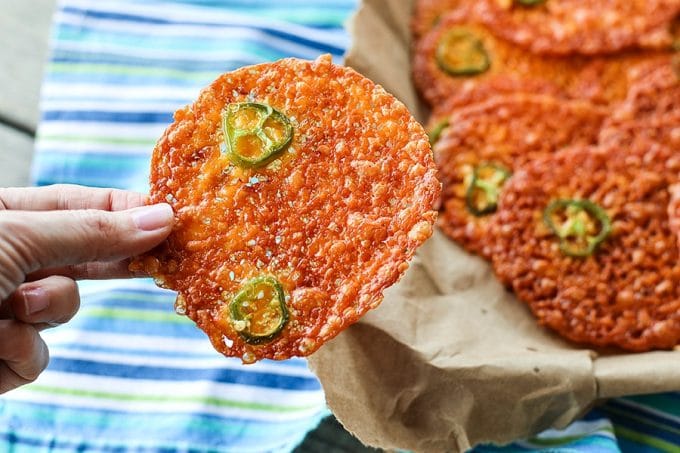 Cracklingly crisp, spicy 2-Ingredient Jalapeno Popper Crisps are a fabulously simple cracker for soups, stews, and salads. Bonus: They're low-carb, too!