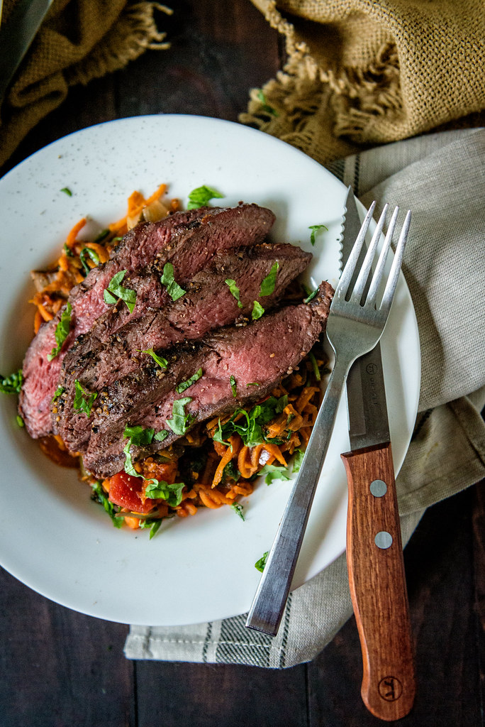 Grilled Flat Iron Steak over Marinara Tossed Sweet Potato Noodles {Girl Carnivore}