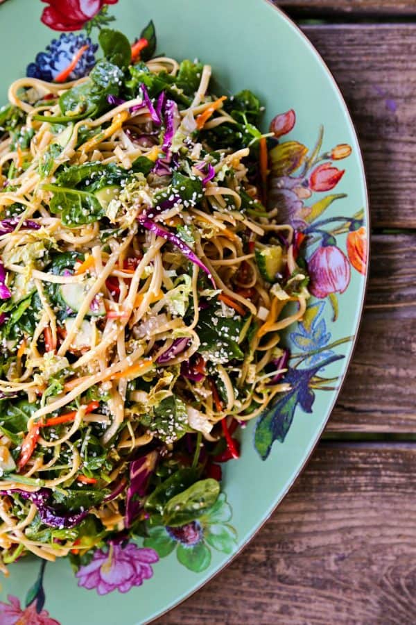 Asian noodle Salad with a garlic soy vinaigrette and loads of colourful, fresh vegetables on a Mackenzie Childs Platter.