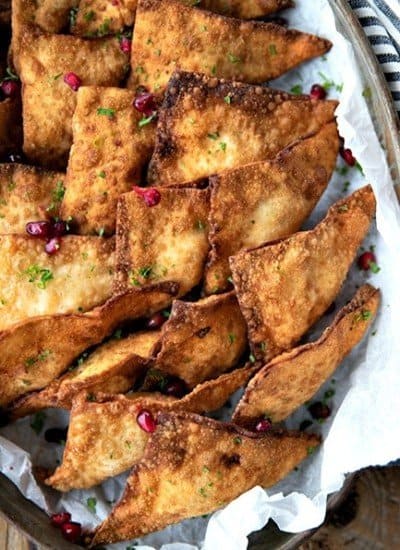 Crispy, crunchy wontons stuffed with an irresistible filling of cream cheese, crab meat, savoury bacon, and zingy horseradish make this a great twist on the classic Crab Rangoon.