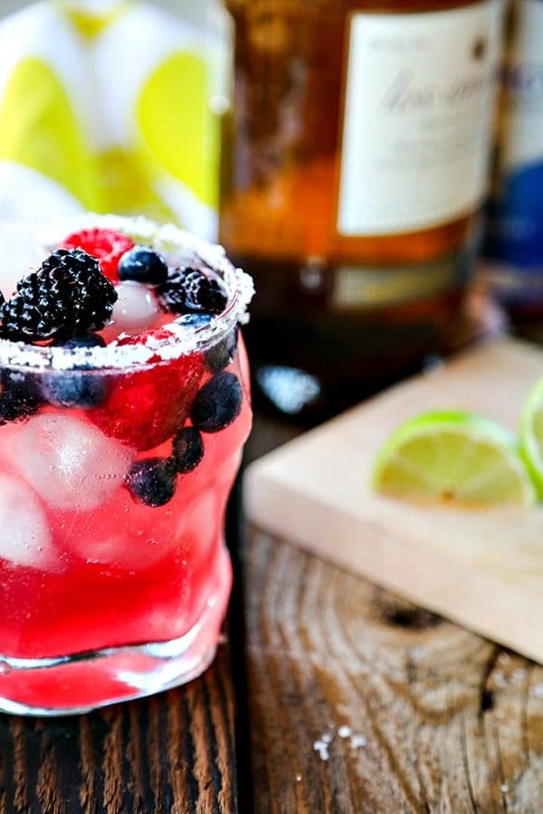 Tart and sweet, refreshing berry Kombucha stands in for most of the lime juice in this modern twist on the classic Margarita; Berry Kombucha Margaritas. With or without the traditional salted rim, you'll reach for this on hot days all summer long!