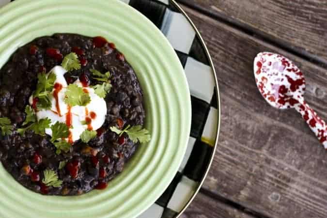 A bowl of Brazilian Black Bean and Sweet Potato Stew | www.foodiewithfamily.com