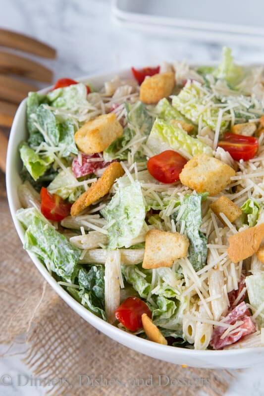 Caesar Pasta Salad - combine two favorites for one perfect summer side dish. Caesar salad and pasts salad come together in an easy dish everyone will love!