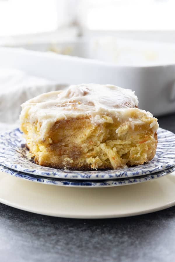 Carrot Cake Rolls are big, FLUFFY AS A CLOUD, & positively studded with super fine shreds of sweet carrots before being rolled up around a spiced buttery brown sugar filling.