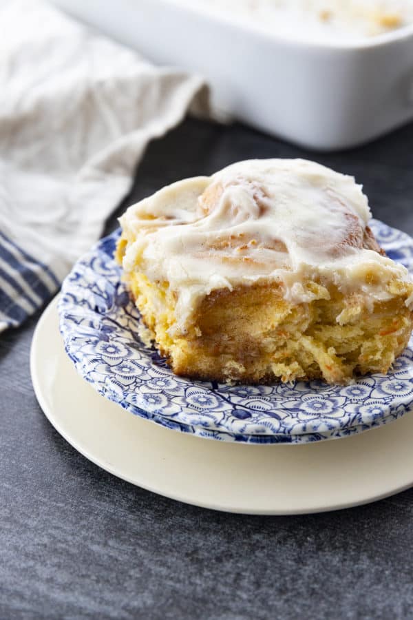 Carrot Cake Rolls are big, FLUFFY AS A CLOUD, & positively studded with super fine shreds of sweet carrots before being rolled up around a spiced buttery brown sugar filling.