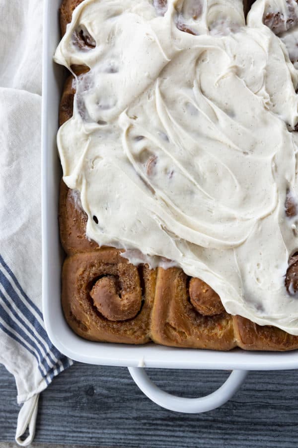 Carrot Cake Rolls are big, FLUFFY AS A CLOUD, & positively studded with super fine shreds of sweet carrots before being rolled up around a spiced buttery brown sugar filling.