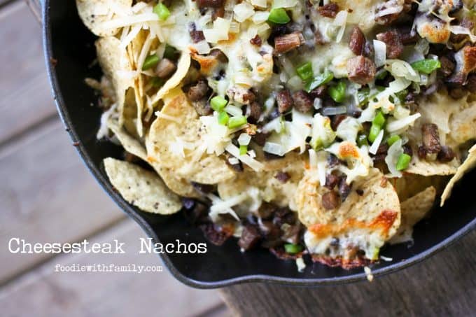 Cheesesteak Nachos are comfort food deluxe from foodiewithfamily.com cheese, tortilla chips, beef, onions, peppers