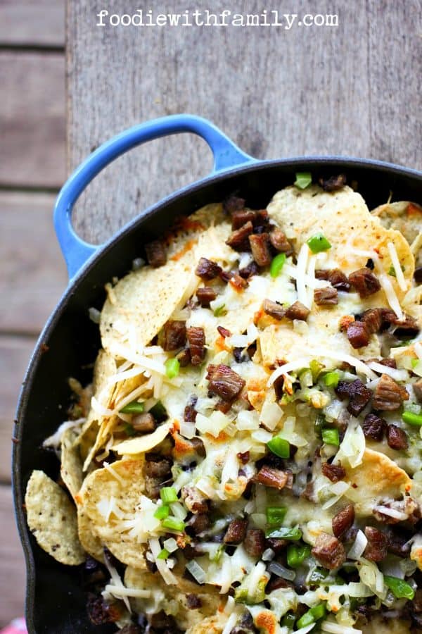 Cheesesteak Nachos are comfort food deluxe from foodiewithfamily.com beef, cheese, onions, peppers