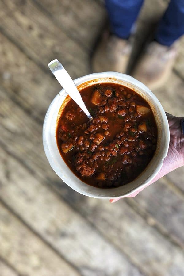 Chorizo Chili is hearty, spicy, slow-simmered chorizo in smoky tomato sauce with tender potatoes, carrots, and lentils. This is serious comfort food!