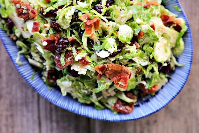 Cranberry Brussels Salad with Bacon Vinaigrette: crisp-tender Brussels sprouts with tart, sweet dried cranberries and a warm bacon, green onion vinaigrette.