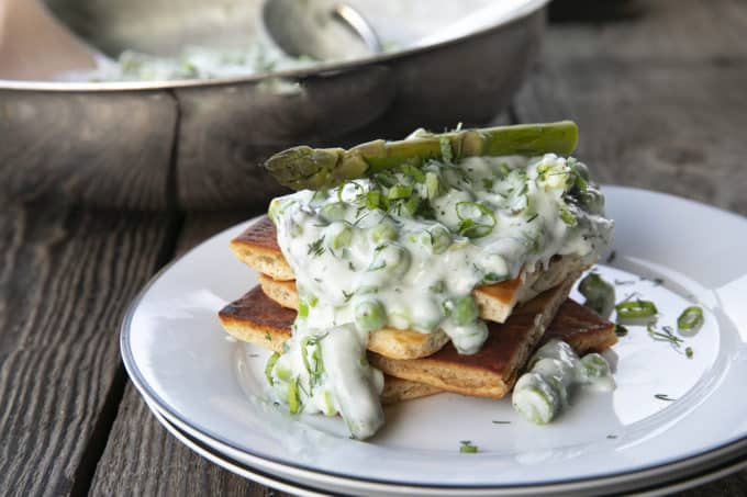 Tender spring peas and asparagus combine in a garden herb cream sauce in this new-fashioned take on delightfully old-fashioned Creamed Peas. Served over toast, this is one simple, economical dish wows!