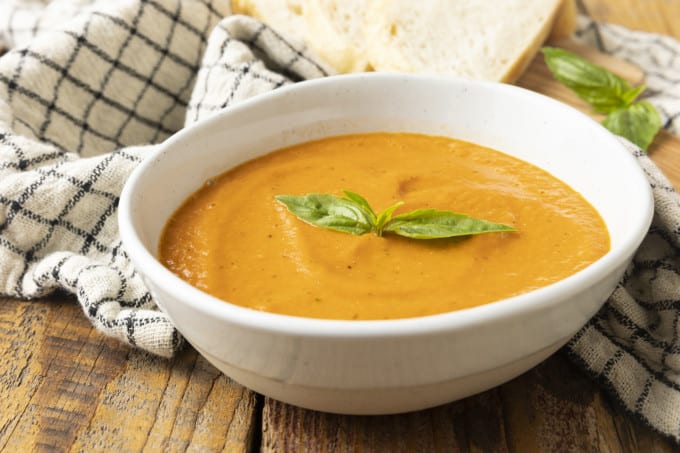 Super smooth, ultra Creamy Tomato Basil Soup is both the best and easiest way to make soup from fresh tomatoes. You’re going to love this so much, you’ll want to double, triple or even quadruple the recipe to keep on hand in the freezer long after summer and fresh tomatoes are a pleasant memory.