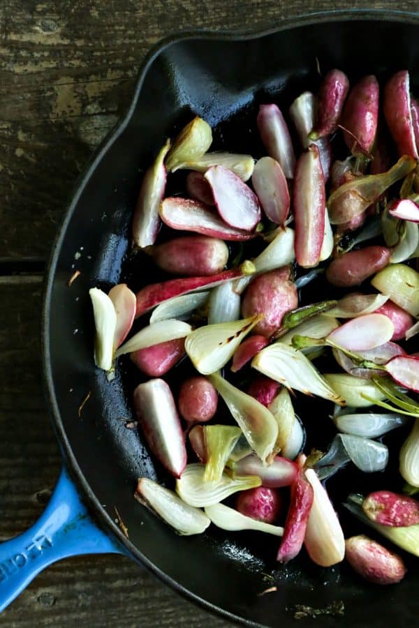 Halfway through the roasting for Crispy Roasted Radishes with Onions