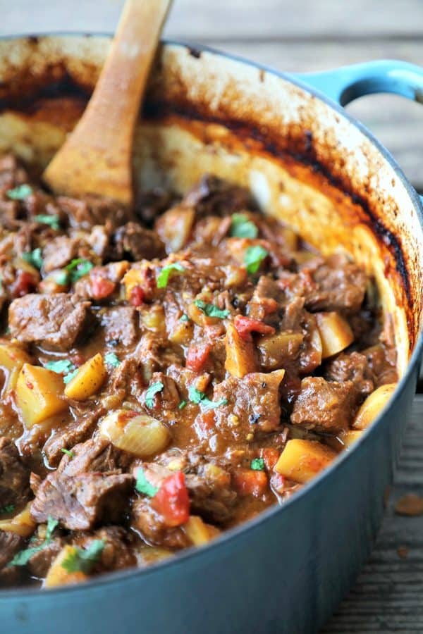 Curried Beef Oven Stew is filled with tender beef cubes, potatoes, carrots, & onions slow-cooked in a flavourful gravy made with soul-warming curry spices.