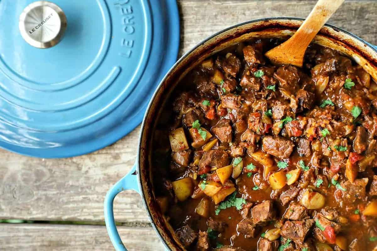 Curried Beef Oven Stew is filled with tender beef cubes, potatoes, carrots, & onions slow-cooked in a flavourful gravy made with soul-warming curry spices.