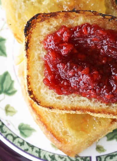 English Muffin Bread topped with strawberry freezer jam and peach freezer jam.