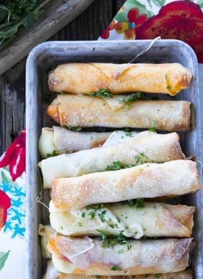 Pizza Logs are crispy, crunchy egg rolls filled with gooey, melted mozzarella cheese and garlicky pepperoni. Whether you whip these up in your air fryer, oven, or in a frying pan, you'll want these not just for game day, but all the time!