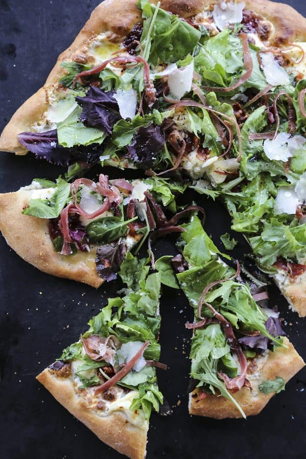 Figgy Pig Pizza - Tuscan Style Prosciutto, fig jam, and greens pizza from foodiewithfamily.com #client #DaVinciStoryteller