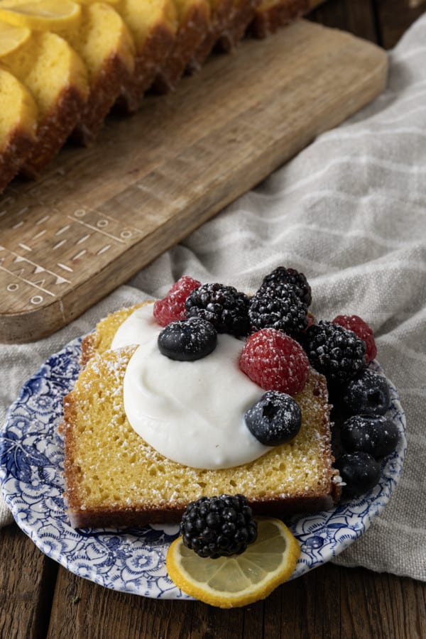 A French Yogurt Cake is quite possibly the most bright and sunny, tender, and just-sweet-enough cake in the entire world. This cake is topped with a thin lemon glaze that firms up and shatters into sugary crust when you bite into it and was brought to world by generation upon generation of French grandmothers and the children who love them!