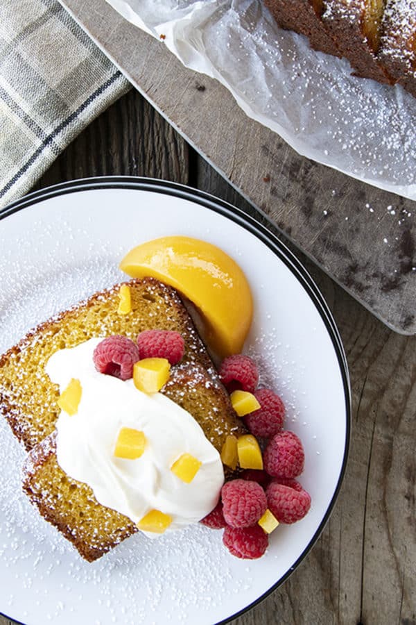 French Yogurt Cake is the world's easiest cake, but that doesn't make it any less impressive, and this Brown Sugar Peach Yogurt Cake is simple to make and simply divine! It's surprisingly sophisticated for a cake made with such humble ingredients.