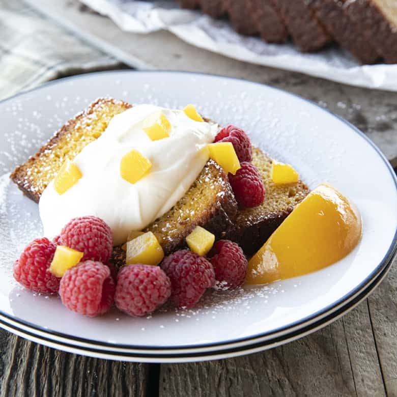 French Yogurt Cake is the world's easiest cake, but that doesn't make it any less impressive, and this Brown Sugar Peach Yogurt Cake is simple to make and simply divine! It's surprisingly sophisticated for a cake made with such humble ingredients.