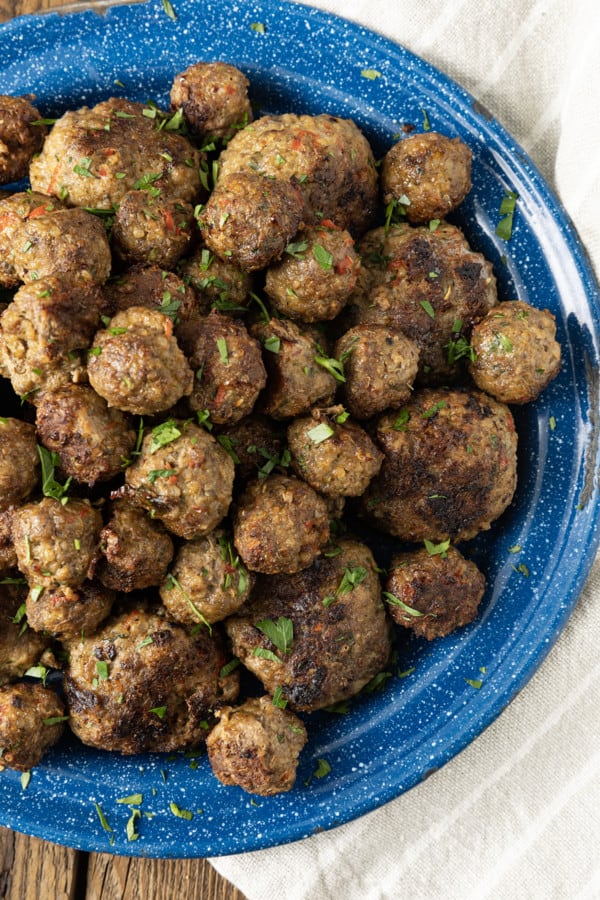 These easy gluten free meatballs are so succulent and savoury with a texture so perfect, you’ll judge all other meatballs by them! Whether you serve them with spaghetti sauce, turn them into Swedish meatballs, tuck them in the best meatball subs, or serve them on toothpicks as an appetizer, you’ll never miss the gluten!