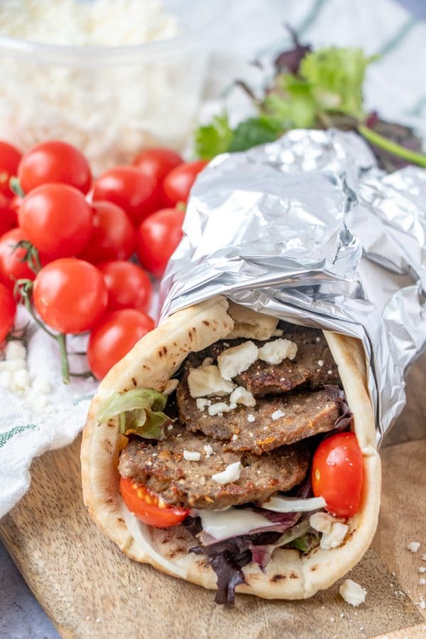 Make restaurant worthy homemade gyro meat and gyros -flat breads filled to bursting with garlicky, herbed, crisped strips of Greek/Lebanese meatloaf.