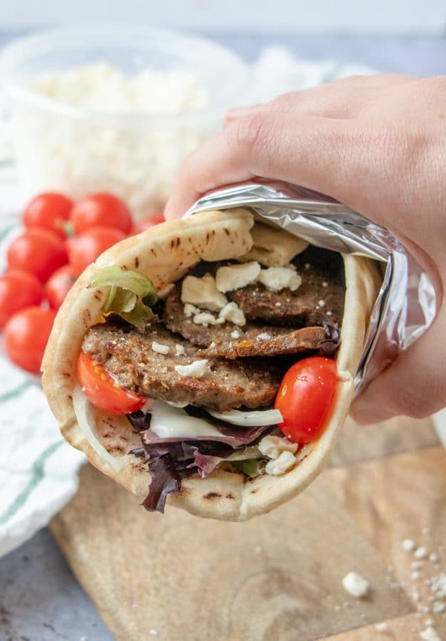 Make restaurant worthy homemade gyro meat and gyros -flat breads filled to bursting with garlicky, herbed, crisped strips of Greek/Lebanese meatloaf.