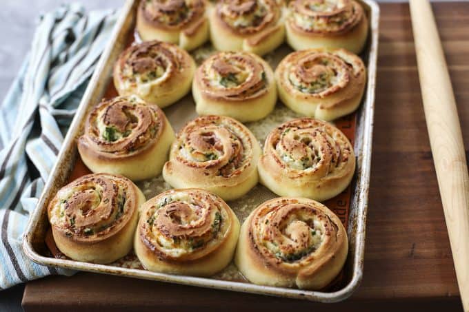 Hot Ham and Cheese Rolls: best bread dough wrapped around smoky ham, piles of Cheddar cheese, and green onions, sliced, and baked to tender perfection.