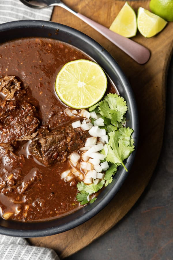 Instant Pot Birria makes fast work of the complex, rich, flavourful Mexican stewed or braised meat that is Birria. While traditional birria is made with goat marinated and then simmered for hours, our version of “birria de res” is done in a fraction of the time and made with more readily available beef.