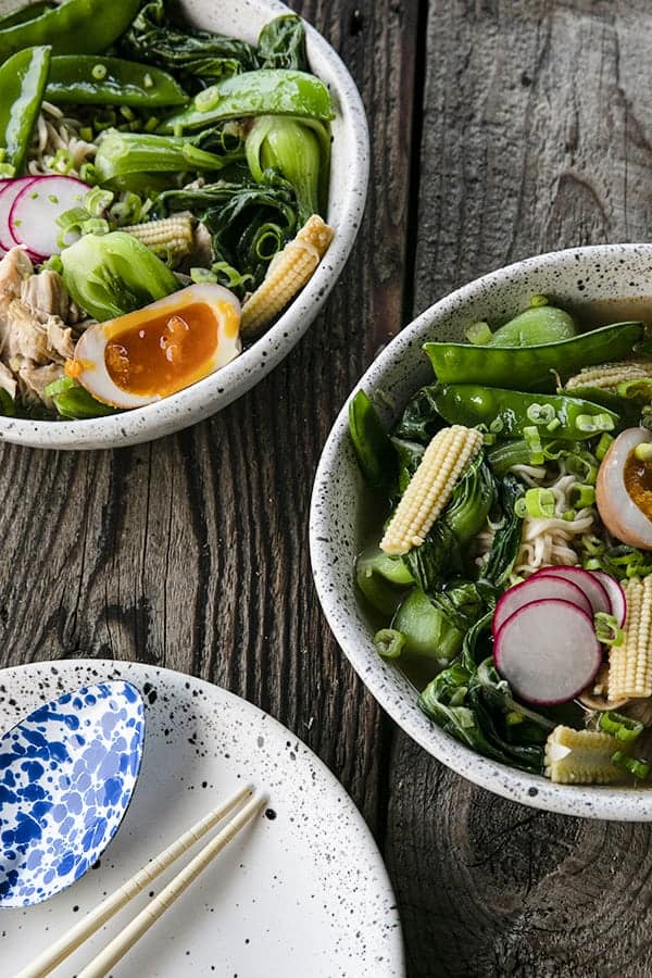 Instant Pot Chicken Ramen with jammy egg, baby corn, pea pods, bok choy, mushrooms, and radishes.