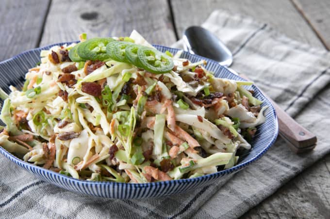 Jalapeno Coleslaw is a deliciously fresh, crunchy, savoury, summery salad to accompany all your grilled main dishes. Creamy, tangy, and easily adjustable to suit your heat-preferences, this super fresh spicy coleslaw is one you'll reach for again and again.