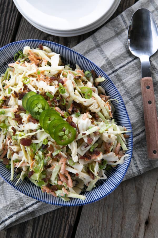 Jalapeno Coleslaw is a deliciously fresh, crunchy, savoury, summery salad to accompany all your grilled main dishes. Creamy, tangy, and easily adjustable to suit your heat-preferences, this super fresh spicy coleslaw is one you'll reach for again and again.