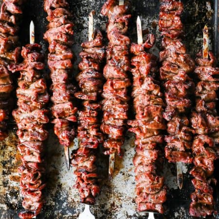 Korean Barbecue Grilled Flat Iron Steak is smoky, garlicky, unbelievably tender, and simple to prepare. This versatile main will be your new summer go-to!