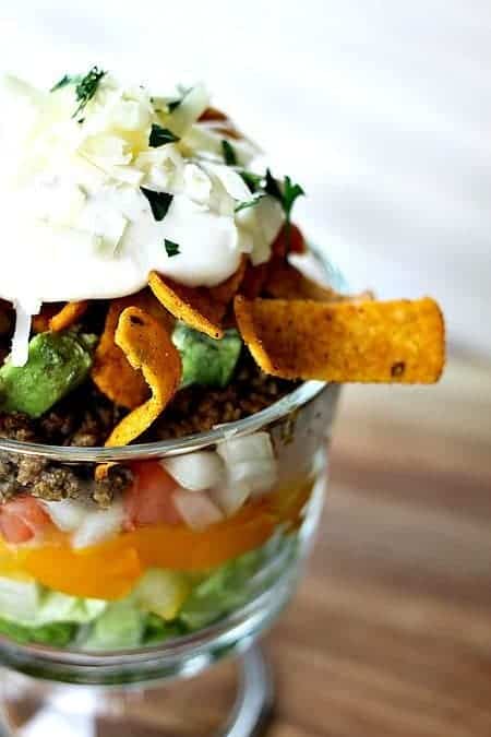 Layered Chopped Taco Salad from foodiewithfamily.com