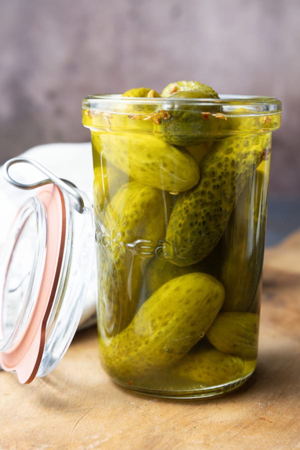 Moonshine pickles might sound crazy, but these high-octane pickles and their brine make cocktail time infinitely more exciting. Crunchy, delicious, and ever-so delicious, you can snack on the pickles then take a shot of the brine! Where are my pickle loving party people? Because not only are these dill-icious, but they’re about as easy as 1-2-3.