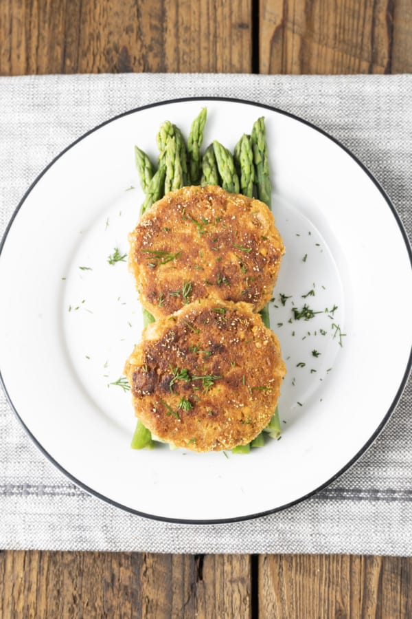 Made of simple ingredients from the pantry, our Old-Fashioned Salmon Patties recipe yields sizzling, golden brown salmon cakes that are crunchy on the outside and tender on the inside. This is one of the ultimate pantry staple recipes, using canned salmon, mayonnaise, cracker or bread crumbs, egg, and seasoning. Simple salmon patties (a.k.a. Salmon cakes or salmon croquettes) like these are ubiquitous in southern households for a reason. This classic recipe is tremendously budget friendly, unbelievably easy to make, and pleasing to even picky eaters!