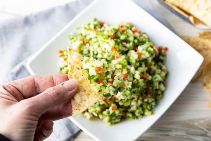 Pickle de Gallo combines everything you love about garlicky dill pickles with the crunch of fresh cucumbers, red bell peppers, and onions, and the snackability of pico de gallo or salsa. It's about to be your new favourite thing.