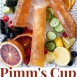 Pimm's Cup Recipe boozy popsicles are made of a gin-based liqueur, fizzy Prosecco, a hint of lemon and strawberry puree, and are guaranteed to refresh you!