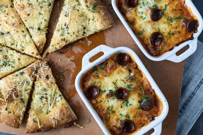 There’s no easier, more comforting dinner on the fly than this easy pizza bowl recipe! Garlicky marinara sauce, mozzarella cheese, pepperoni, succulent Italian sausage, and whatever else you love as pizza toppings are baked in individual servings until the cheese is bubbling and melted and the pepperoni is crispy at the edges.