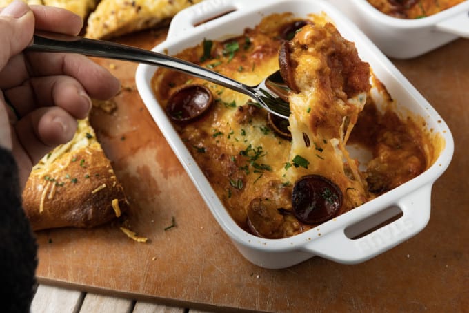 There’s no easier, more comforting dinner on the fly than this easy pizza bowl recipe! Garlicky marinara sauce, mozzarella cheese, pepperoni, succulent Italian sausage, and whatever else you love as pizza toppings are baked in individual servings until the cheese is bubbling and melted and the pepperoni is crispy at the edges.