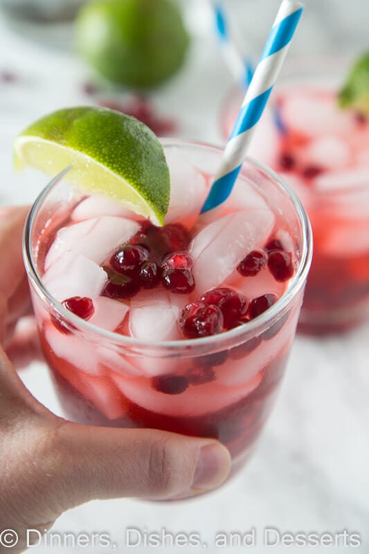 Pomegranate Vodka Gimlet - a classic vodka gimlet with a little pomegranate juice and pomegranate seeds for a fun and festive twist!