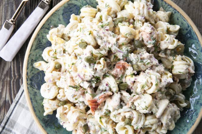 Smoked Salmon Pasta Salad is about to become your new favourite pasta salad. Savoury smoked salmon, a simple creamy dill dressing, hard-boiled eggs, capers, and red onions combine to amp up pasta salad to a whole new level. You'll find yourself craving this!