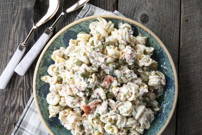 Smoked Salmon Pasta Salad is about to become your new favourite pasta salad. Savoury smoked salmon, a simple creamy dill dressing, hard-boiled eggs, capers, and red onions combine to amp up pasta salad to a whole new level. You'll find yourself craving this!