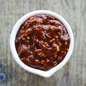 Ssamjang Korean Spicy Dipping Sauce is as easy as it is delicious and habit forming! Serve as a dip for Korean Barbecue, pork roasts, bo ssam, on lettuce wraps, or any other number of delicious things!