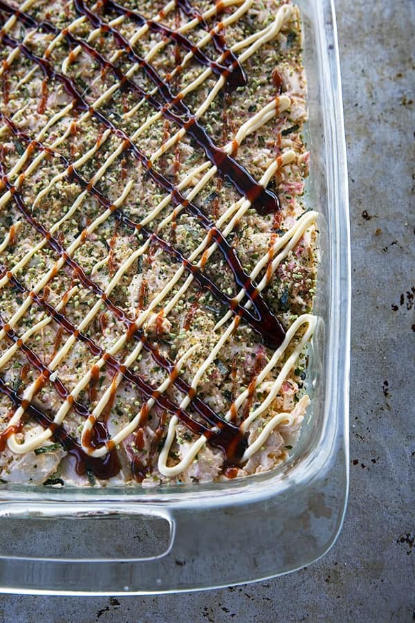 Sushi Bake ready to go into the oven with sauce.