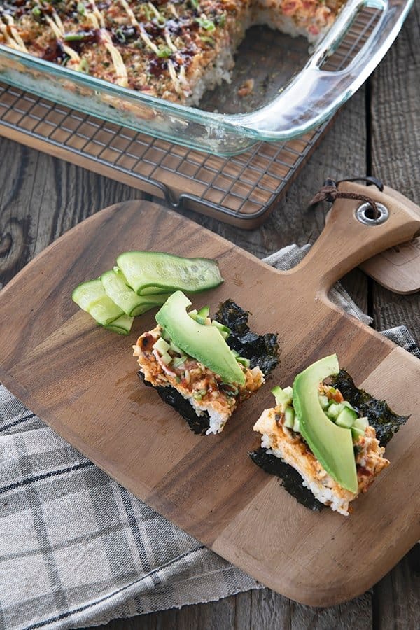 Sushi Bake rice topped with creamy crab layer and sauce serve on toasted nori