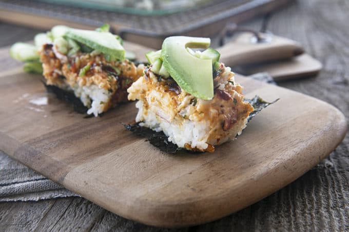 Sushi Bake rice topped with creamy crab layer and sauce serve on toasted nori