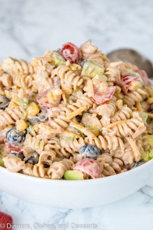 Taco Pasta Salad - a creamy pasta salad with all your favorite taco toppings! Great to make ahead and have in the fridge for dinner or to take to any get together.