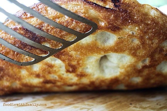 The crust on Preparing dough for The Best Pan Pizza {super easy!} from foodiewithfamily.com